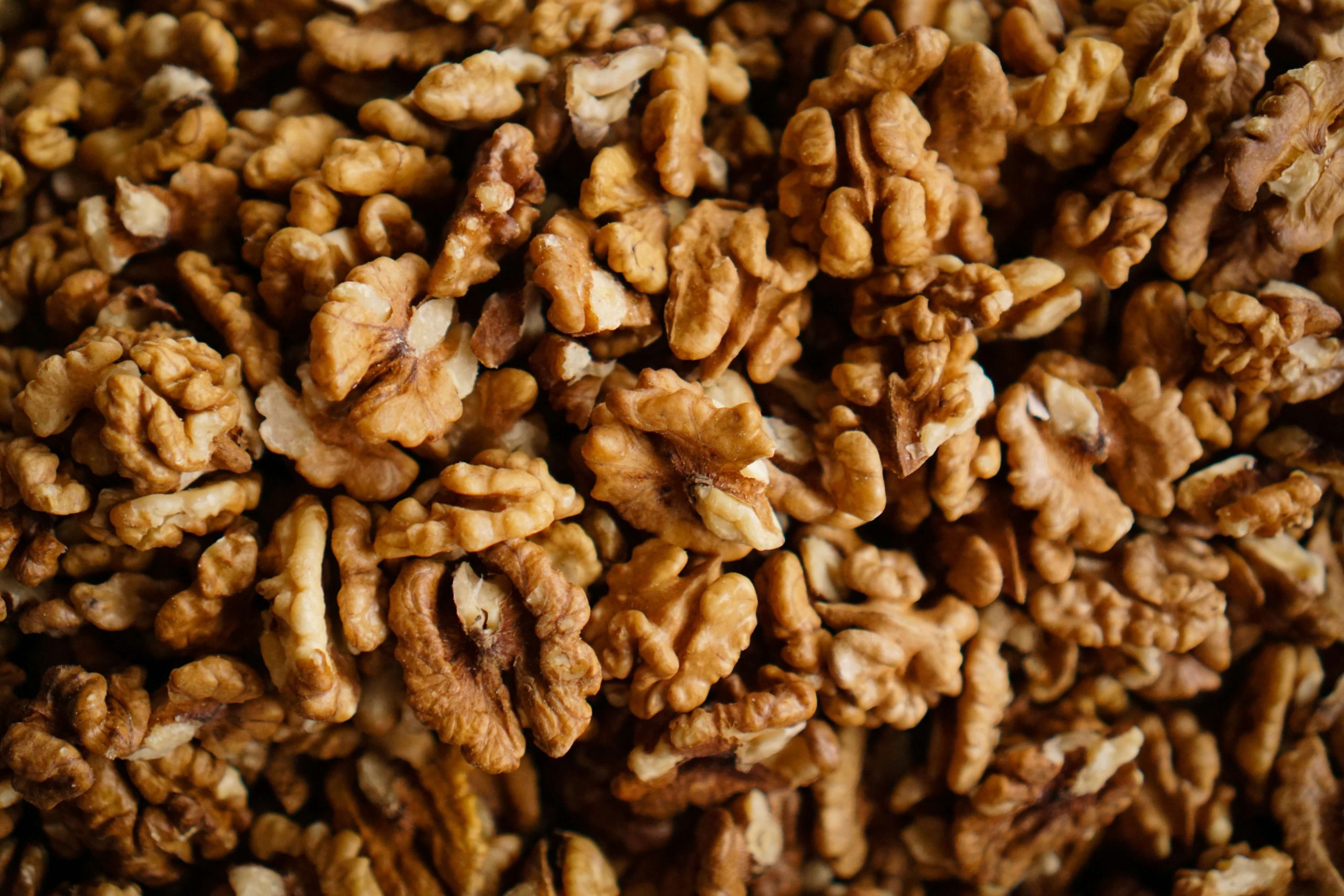 A photo of nuts (walnuts), which are a large part of a carbohydrate-restricted diet.